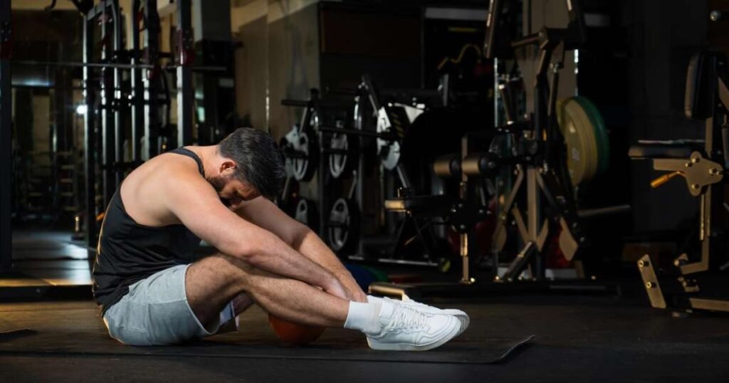 Pessoa treinando em academia, representando a transformação mental através do exercício