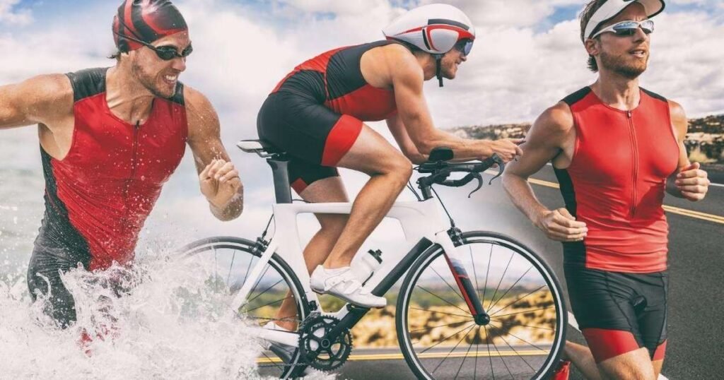 Atleta cruzando a linha de chegada de um IRONMAN, demonstrando exaustão e esforço físico.